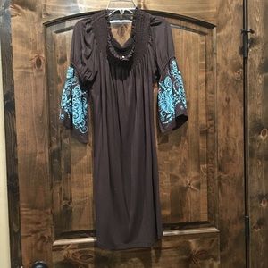 Brown western dress with bell sleeves.